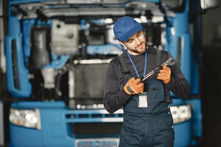 Mechanic repairing the truck 