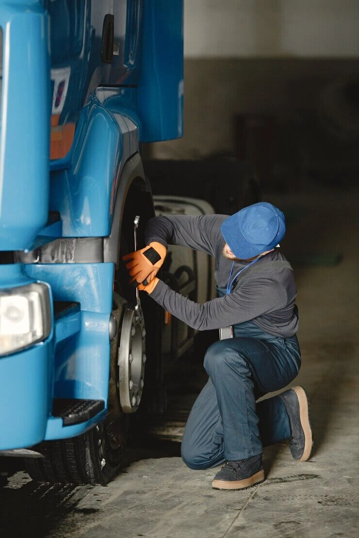 Mechanic changing tire